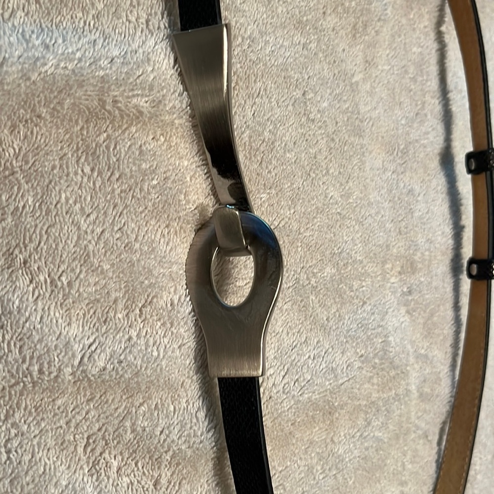 Women’s black leather lined belt 1/2 inch wide, adjustable size from 22”-38”
